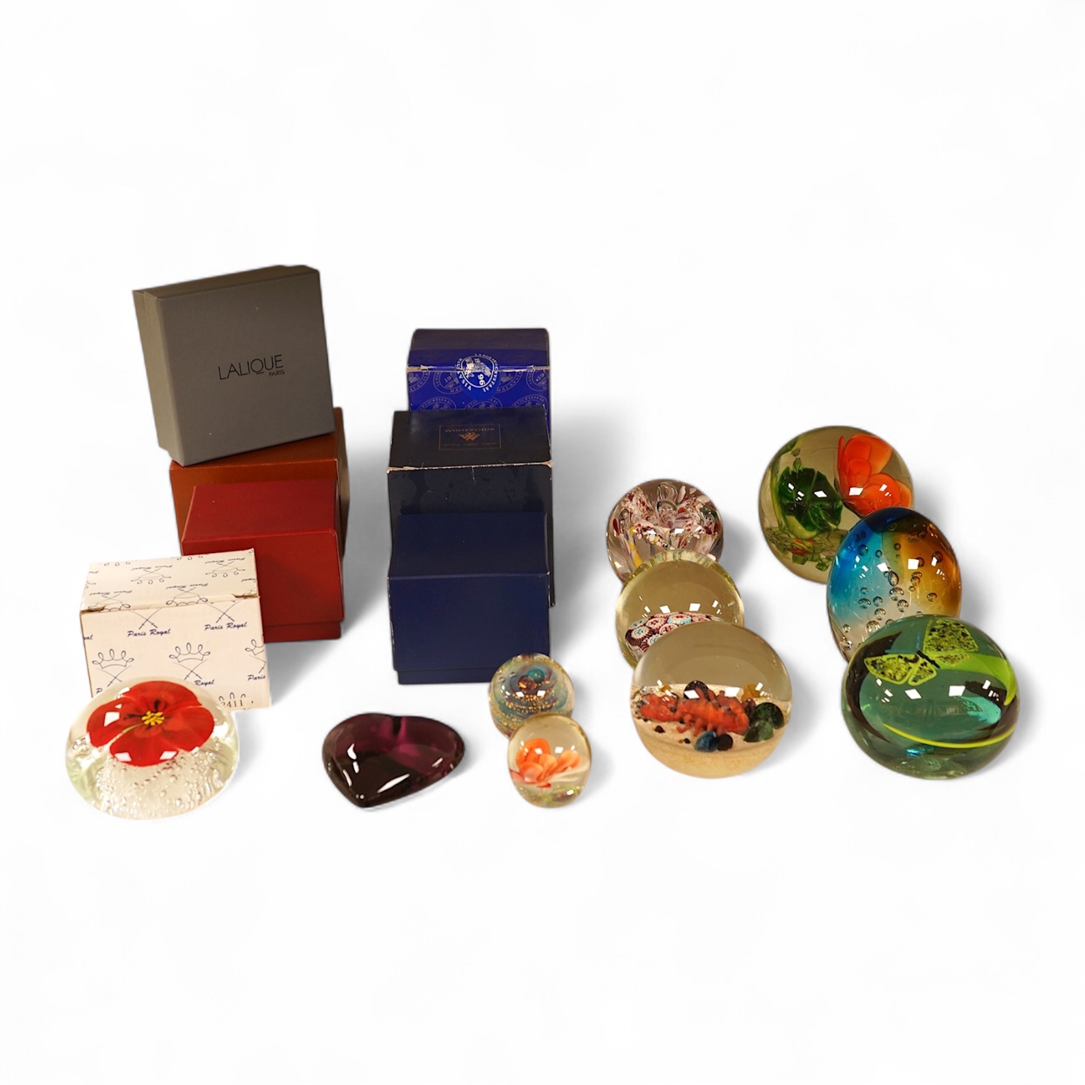 Seventeen various paperweights, including Lalique and a signed Murano example, some boxed, largest 10cm high